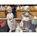 Lladro Dutch Girl Figurine, No. 5064, 11'' tall, together with a Lladro Nao figure girl with basket,