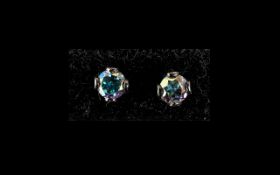 Mystic Topaz Stud Earrings, each earring comprising a round cut topaz of over 1.