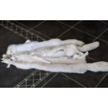Three Arctic Fox Pelts, Excellent condition. Each measuring approx 136 cms in length.