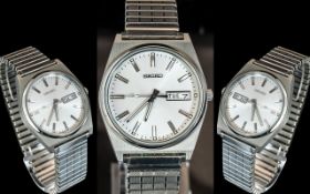 Seiko Gents Quartz Day-Date Mechanical Wind Stainless Steel Wrist Watch.