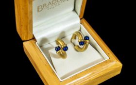 Ladies Fine Pair of 14ct Gold Contemporary Sapphire Set Earrings.