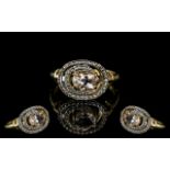 9ct Gold Diamond & Gem Set Ring, central pink stone surrounded by round cut diamonds,