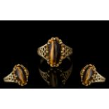 Ladies 9ct Gold Attractive Single Stone Tigers Eye Set Ring with Decorative Setting and Shoulder.