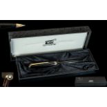 Mont blanc Classic Black and Gold Cased Fountain Pen, With 14ct Gold Nib with Mont Blanc Box.