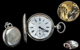 An Omega Full Hunter Pocket Watch, white enamel dial, Roman numerals, with subsidiary seconds.