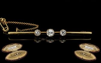 Victorian Pleasing 18ct Gold Bar Brooch, set with old round cut diamonds, marked 18ct.
