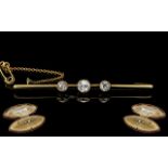 Victorian Pleasing 18ct Gold Bar Brooch, set with old round cut diamonds, marked 18ct.