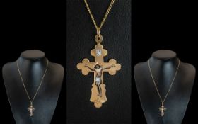 An Antique 14 ct Gold Russian Enamel Cross Suspended On An 18ct Gold Chain.