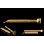 A Vintage Excellent Quality 9ct Gold Cigar Piercer ( Push Action ) With Engine Turned Decoration