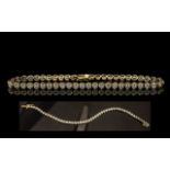 9ct Gold Diamond Set Line Bracelet. Full Hallmark for 9,375. Est Diamond Weight 0.50 pts.