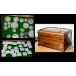 A Specimen Six Drawer Coin Cabinet, each drawer containing a quantity of coins,