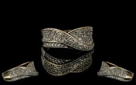 Ladies 9ct Gold Attractive Diamond Set Ring. Full Hallmark for 9.75. Est Diamond Weight 1.00 ct.