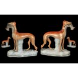 Staffordshire 19th Century Pair of Hand Painted Pottery Figures Depicting a Pair of Whippets,