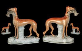 Staffordshire 19th Century Pair of Hand Painted Pottery Figures Depicting a Pair of Whippets,