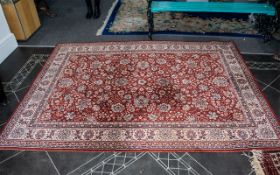 Large Decorwool Royal Exclusive Rug in red and cream with a border pattern. Good condition, measures