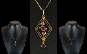 Victorian Period Attractive 9ct Gold Exquisite Open Worked Pendant, set with rubies and seed pearls.