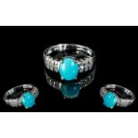 Turquoise and White Zircon Ring, an oval cut cabochon of over 2cts of the bright, matrix free,