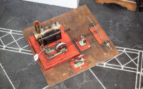 Model Steam Engine, mounted on a wooden board, measures 18" square.