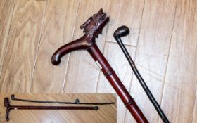 A Victorian Walking Cane, together with one other. Longest 35".