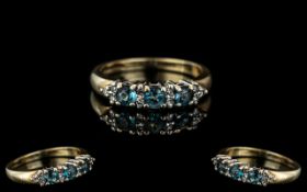 Ladies 9ct Gold Attractive Diamond and Aquamarine Set Dress Ring.