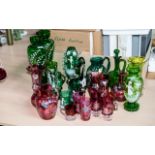 Collection of Quality Coloured Glass, including Mary Gregory style green hand painted glass jugs,