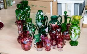 Collection of Quality Coloured Glass, including Mary Gregory style green hand painted glass jugs,