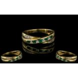 9ct Emerald & Diamond Dress Ring, set with alternating emeralds and diamonds, on a twist style.