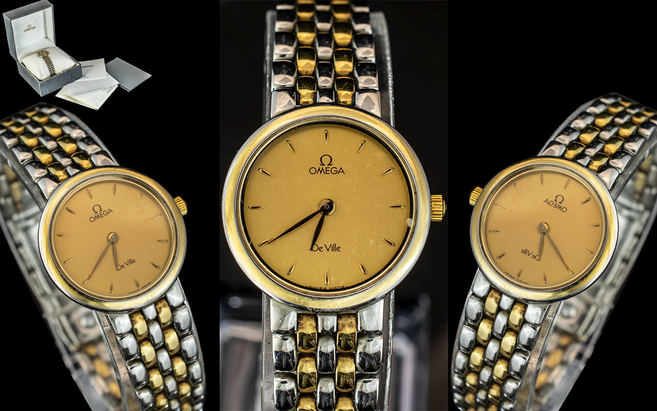 Omega - Deville Ladies 18ct Gold and Steel Quartz Bracelet Watch, With Champagne Dial. Model No