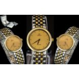 Omega - Deville Ladies 18ct Gold and Steel Quartz Bracelet Watch, With Champagne Dial. Model No