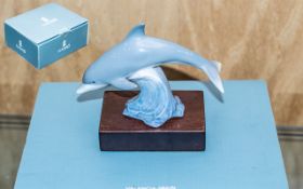 Lladro Baby Dolphin with Stand - Titled ' Lucky Dolphin ' Model No 01008104.