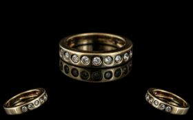 9ct Gold Diamond Set Eternity Ring, set with 9 round modern brilliant cut diamonds,