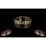 9ct Gold Diamond Set Eternity Ring, set with 9 round modern brilliant cut diamonds,