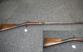 A 19th Century Percussion Riffle Walnut Stock With Ramrod, Steel Mounts. Overall length 48 inches.