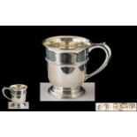 A Sterling Silver Christening Cup - Hallmark Birmingham 1928, Makers Mark S-Ltd. Height 2.