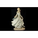 Lladro Figure No. 4828 'Cinderella', measures 10'' tall, in original box.