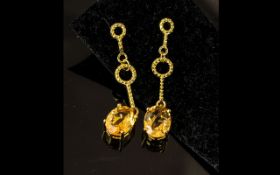 Citrine Drop Earrings, oval cut citrines of a warm, golden yellow hue, each of 2.