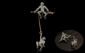 A 19th Century Sterling Silver Novelty Stone Set, Monkeys On A Swing Brooch Marked 925.