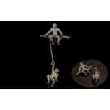 A 19th Century Sterling Silver Novelty Stone Set, Monkeys On A Swing Brooch Marked 925.