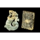 A Pair of Jade Amulets in the archaic style, one in the form of a dragon 2.5" x 1.