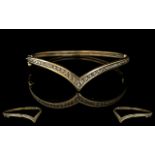 Ladies 9ct Gold Diamond Set Wishbone Hinged Bangle with Safety Lock. Fully Hallmarked for 9.375.