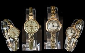 A Fine Pair of Ladies 9ct Gold Cased Mechanical Wrist Watches with gold plated watch straps.