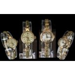 A Fine Pair of Ladies 9ct Gold Cased Mechanical Wrist Watches with gold plated watch straps.