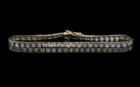9ct White Gold Diamond Line Bracelet, each link set with round cut diamond, fully hallmarked,