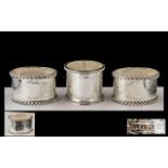 A Fine Trio Of Sterling Silver Ornate Napkin Holders - All Fully Hallmarked and in Near Mint
