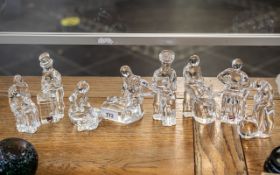 Orrefors Swedish Glass - set of eight Swedish glass figures depicting glassblower, baker,