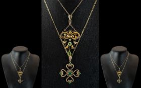 9ct Gold Edwardian Pendant, set with three green coloured gemstones,