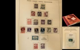 Stamp interest: Old Schaubek stamp album of Hunagrian stamps. Please see the first page! Includes