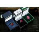 Collection of Three 9ct Gold Dress Rings set with red faceted stones, look to be Ruby and Garnet.