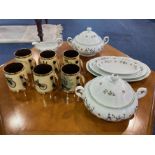 A Small Collection Of Porcelain comprising, six drinking tankards, three serving platters,