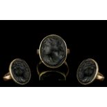 Antique Period 9ct Gold Black Basalt Bust Cameo Ring of Oval Form. Marked 9ct. Ring Size M.